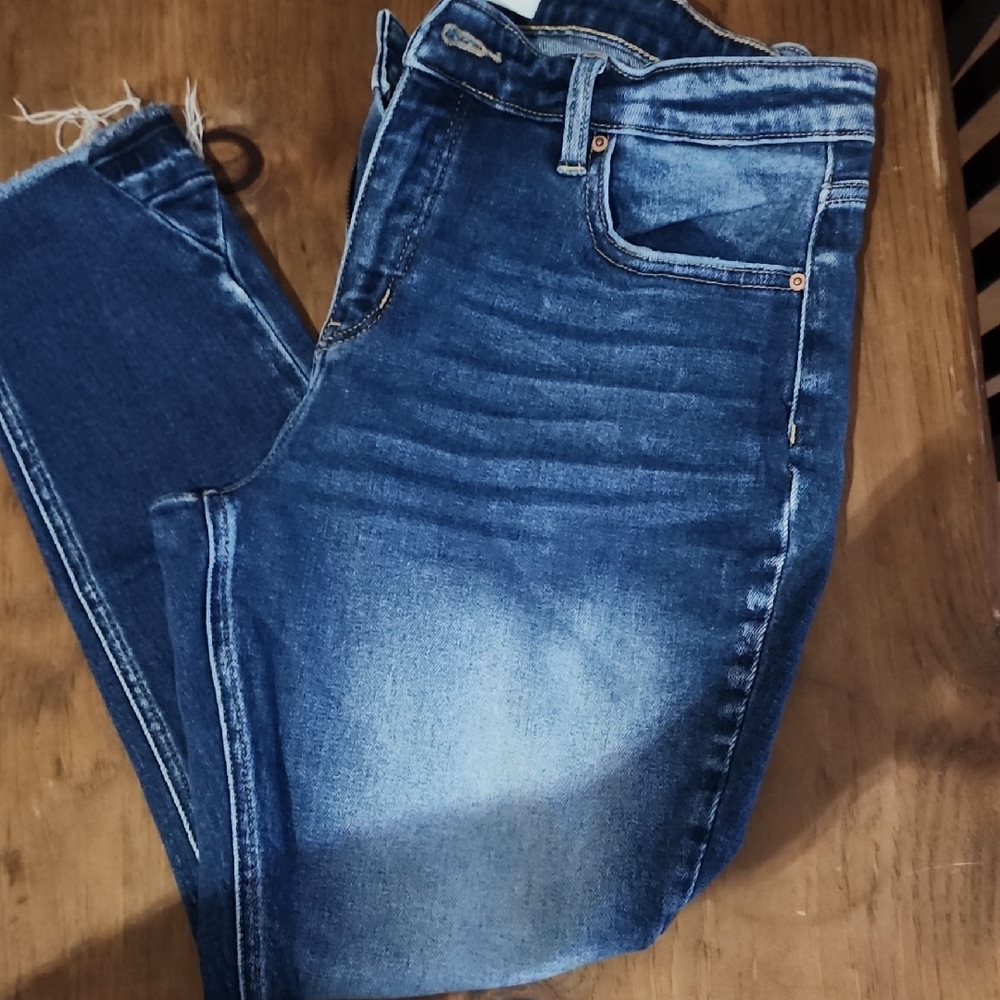 Buckle High Rise Blue Jeans with Faded Whiskering